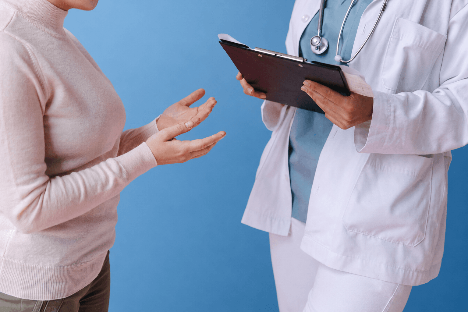Clinician in blue scrubs representing primary and comprehensive care
